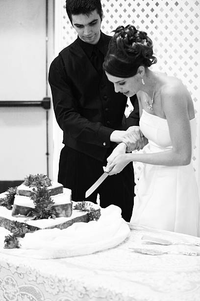 istock Cake Cutting Bride and Groom 176905309
