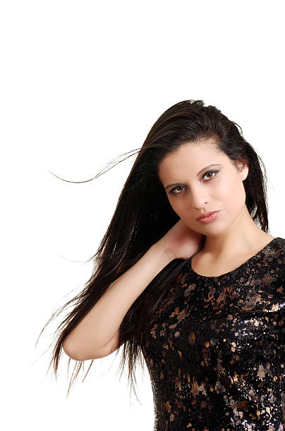 istock young hispanic woman with hair blowing 176906152