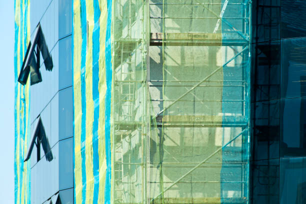 istock Scaffolding and netting , glass facade. 1769061856