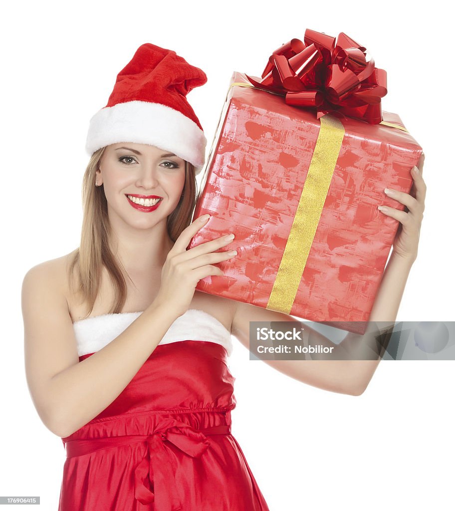 Cheerful christmas girl with big gift box. Cheerful christmas girl with big gift box. Isolated over a white background. Adult Stock Photo