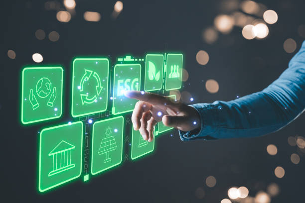 istock hand touch hologram to save energy,and reduce global warming,climate change,ecology friendly investment,ESG environment social governance,Green Business Innovation and Sustainable Development concept. 1769066882