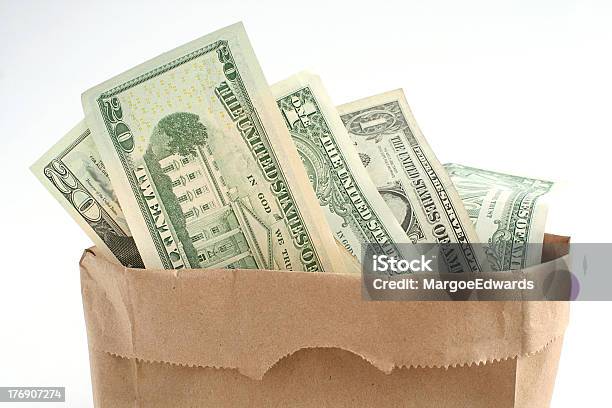 Bagful Of Money Stock Photo - Download Image Now - Paper Bag, Currency, Bag