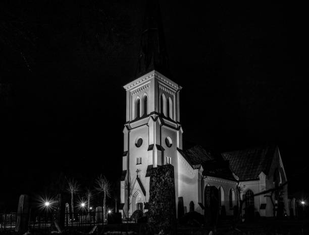istock a church tower lit up at night 1769084945