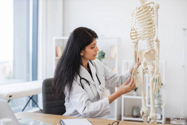 istock Doctor using skeleton model for online lecture on laptop 1769087220