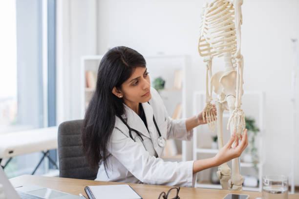 istock Doctor using skeleton model for online lecture on laptop 1769087238