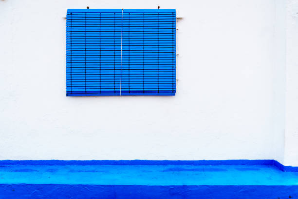 White house with blue shutters