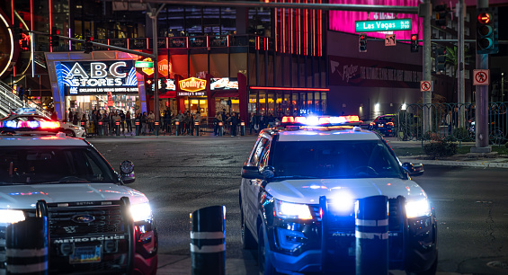 A heavy police presence amongst a crowd of people on the Las Vegas strip.\n\nLas Vegas, Nevada, USA\n10/31/2023