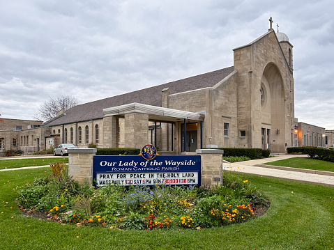 Arlington Heights, IL, USA - October 29, 2023: Sign in front of Our Lady of the Wayside Church asking people to pray for peace in the Holy Land