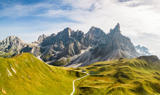 Stunning views in the Dolomites where green meadows meet steep rocks