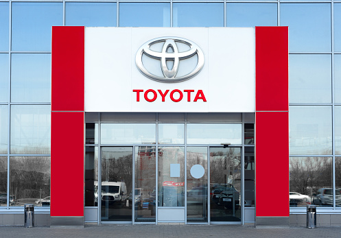 Tbilisi, Georgia - October 27, 2023: Facade of the Toyota Motor car dealership, opens its doors
