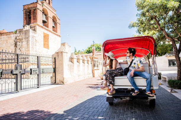 istock Tourist couple in rickshaw ride in historic district 1769310891