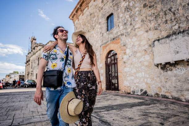 Tourist couple walking in historic district of Santo Domingo, Dominican Republic