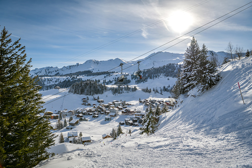 Stoos, Switzerland - January 9, 2021: View on small village of Stoos in Switzerland during sunny winter day in January 2021