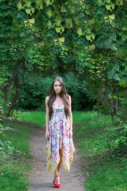 istock Beautiful young woman in nature 176936617