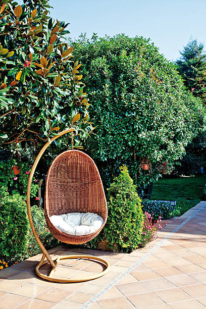 Wicker rattan hang chair In the garden to sit and relax.