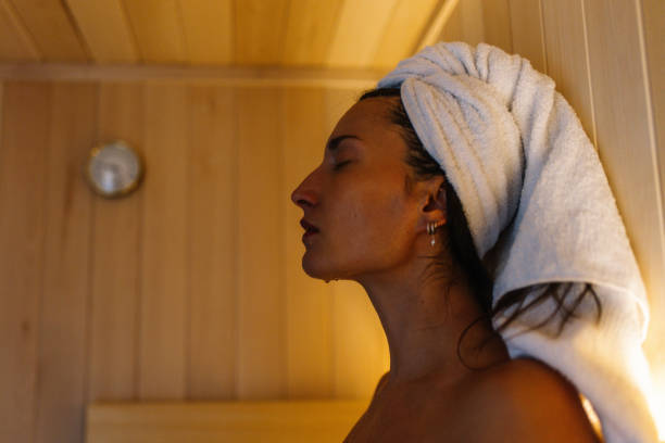 istock Woman relaxing in the hot sauna 1769372894