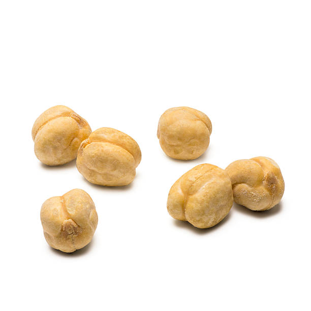 Six chick-peas on a white background stock photo