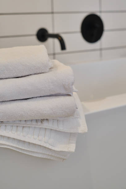 istock A stack of clean white towels in bathroom. Hotel service. Place for text 1769412160