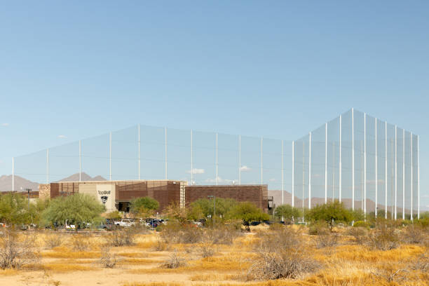 TopGolf located in Scottsdale, AZ. Scottsdale, AZ, USA - October 25, 2023: TopGolf features multiple floors of driving range bays and is a fun entertainment complex for all ages to enjoy. southwest usa architecture building exterior scottsdale stock pictures, royalty-free photos & images