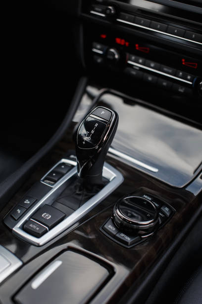istock Automatic transmission gear shift in modern car close up. 1769447342