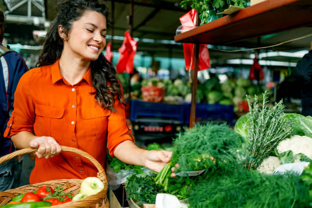 istock Woman browses vegetable options 1769454169