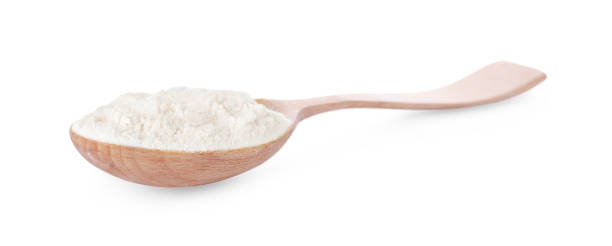 istock Wooden spoon with bean flour isolated on white 1769464425