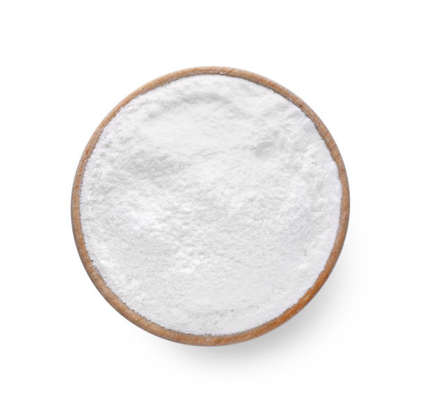 istock Wooden bowl with bean flour isolated on white, top view 1769464466