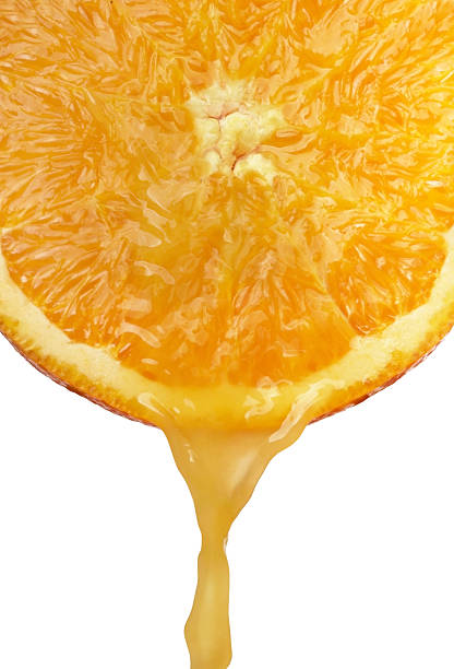 istock Fresh juice following from an orange 176951099