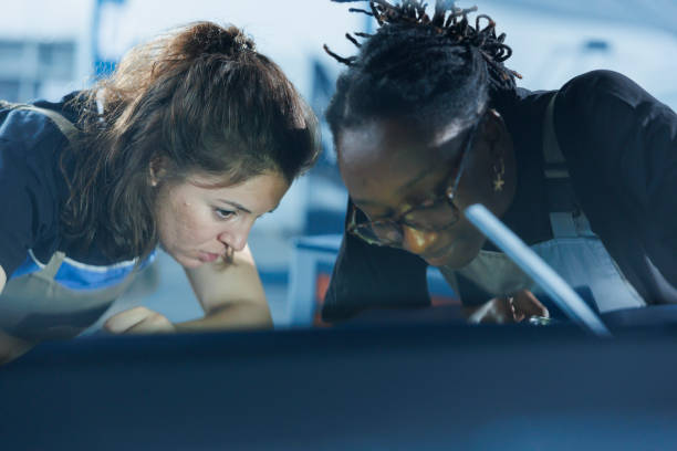 istock Coworkers check car engine damages 1769515002
