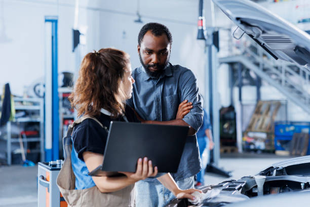 istock Employee in car service orders motor 1769519237