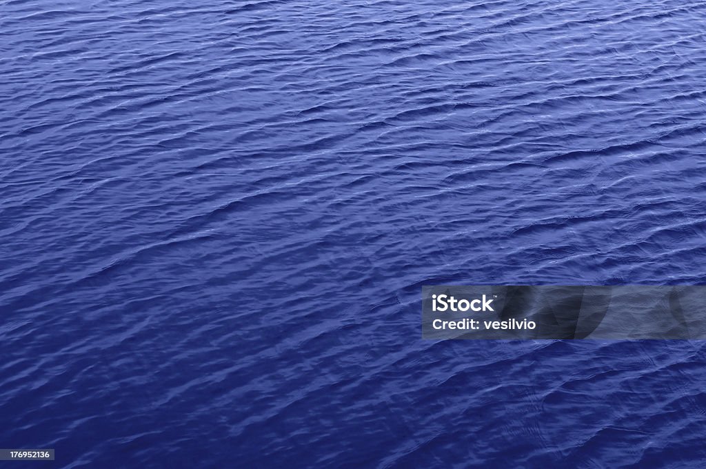 Triciclico superficie dell'acqua - Foto stock royalty-free di Acqua