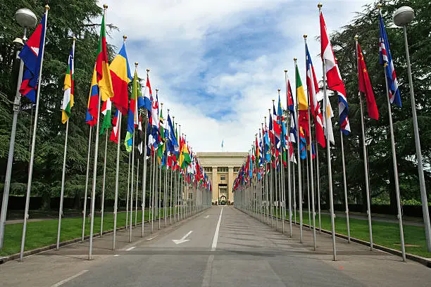 "Photograph of the United Nations entrance and building in Geneva, Switzerland."