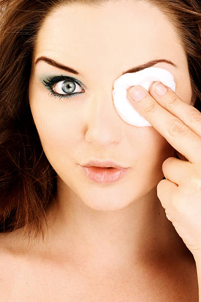 istock Glamorous woman removing her make up 176954485