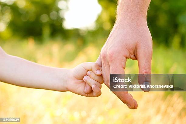 Father Lead By The Hand Son Stock Photo - Download Image Now - Adult, Beautiful People, Beauty