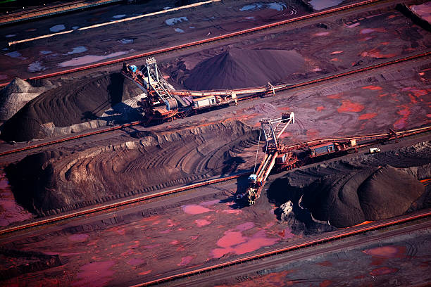 istock Bucket-wheel excavators in a harbor 176955318