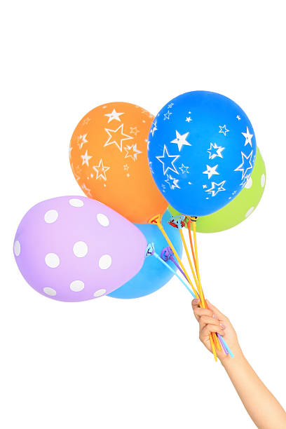 istock Holding colored party balloons 176955475