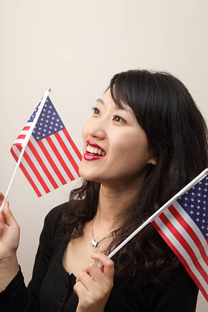 istock woman with an USA flag 176956552