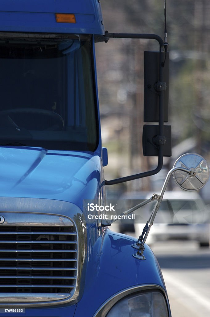 Semi Detail Front View of a Blue Semi Truck Tarpaulin Stock Photo