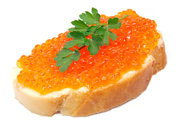 red caviar on white bread stock photo