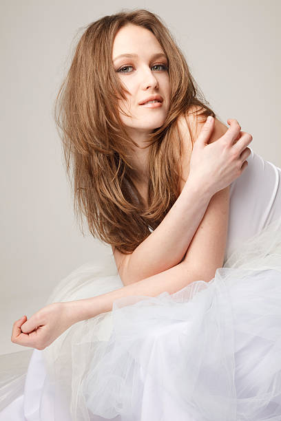 istock Young sensual  girl lying on the bed 176957606