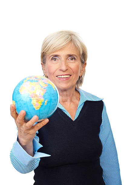 istock Senior corporate woman hold a globe 176957757