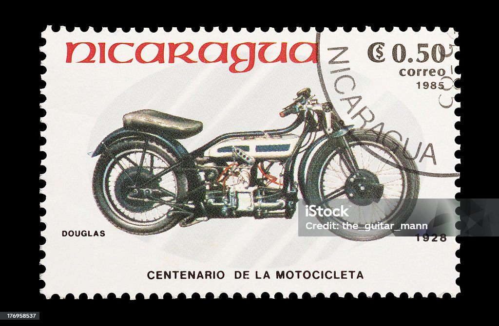 Douglas Motorcycle "Mail stamp printed in Nicaragua featuring a vintage Douglas motorcycle.For more images, please see my themed lightboxes below." Black Background Stock Photo