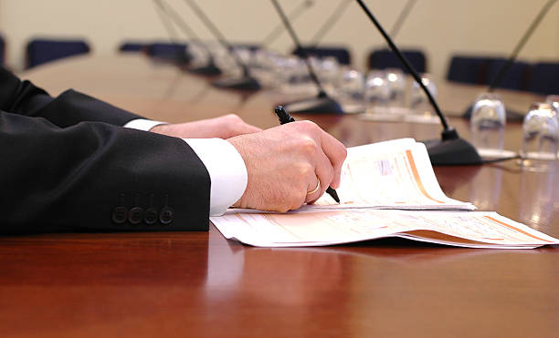 istock businessman showing  stock chart 176958627