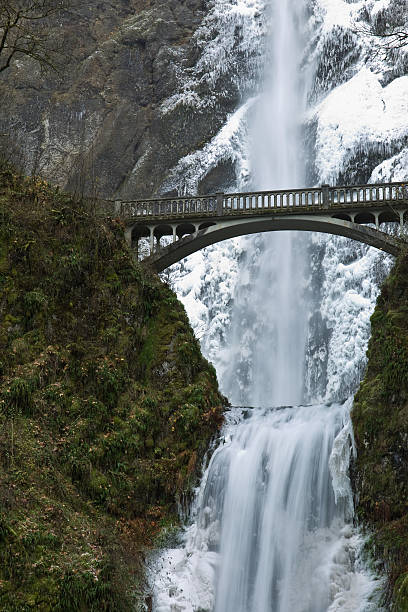 istock Multnomah Waterfalls frozen in winter. 176959589