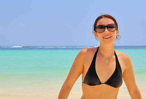 istock Woman on the beach. 176959848