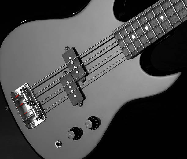 istock black bass guitar detail 176960450