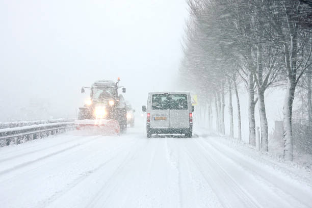 istock Snowplow cleaning the road in Netherlands 176961197