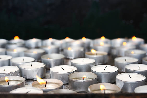 istock Prayer candles in church – close up 176962029