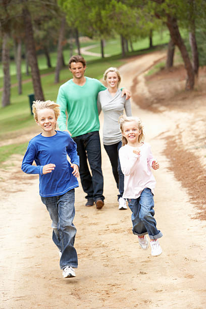 istock Family enjoying walk in park 176962437