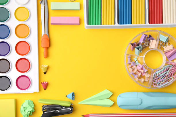 istock Flat lay composition with different school stationery on yellow background, space for text. Back to school 1769629313